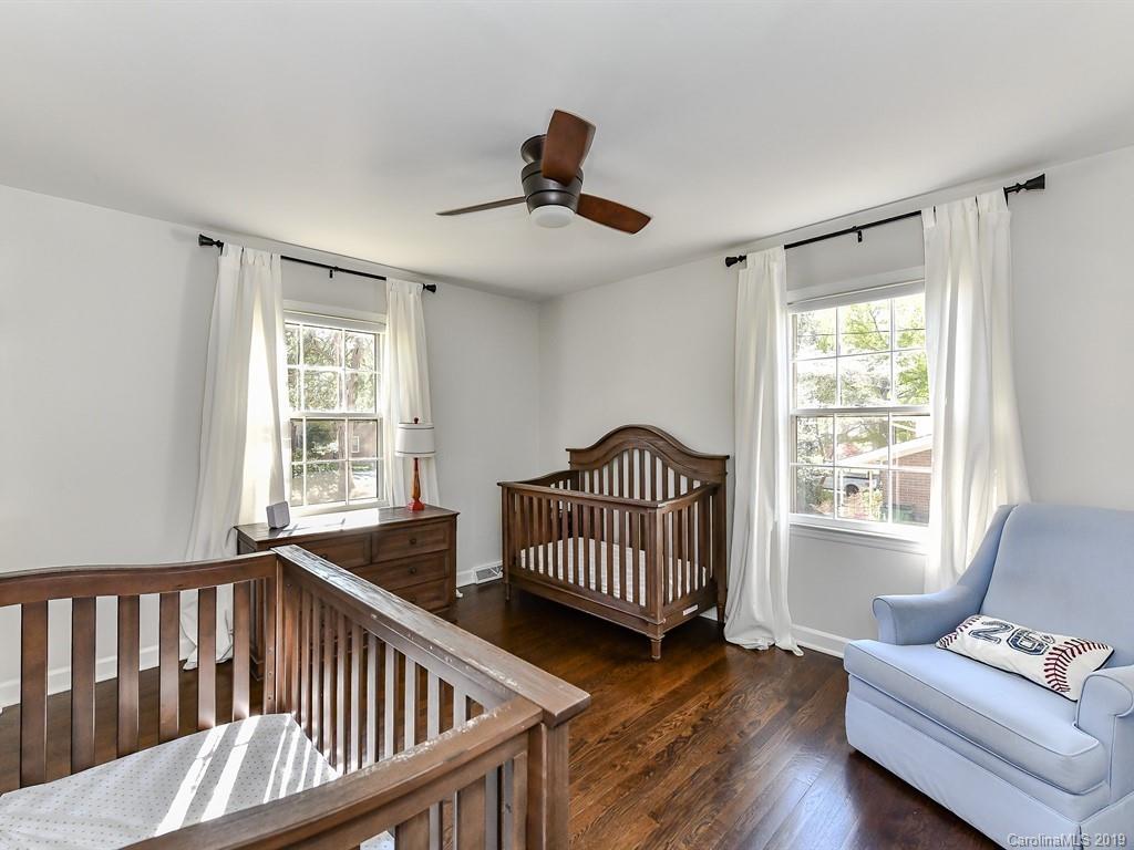 5300 Guildbrook Road Charlotte, NC 28226 - Photo 17 of 35 a bedroom with furniture and wooden floor