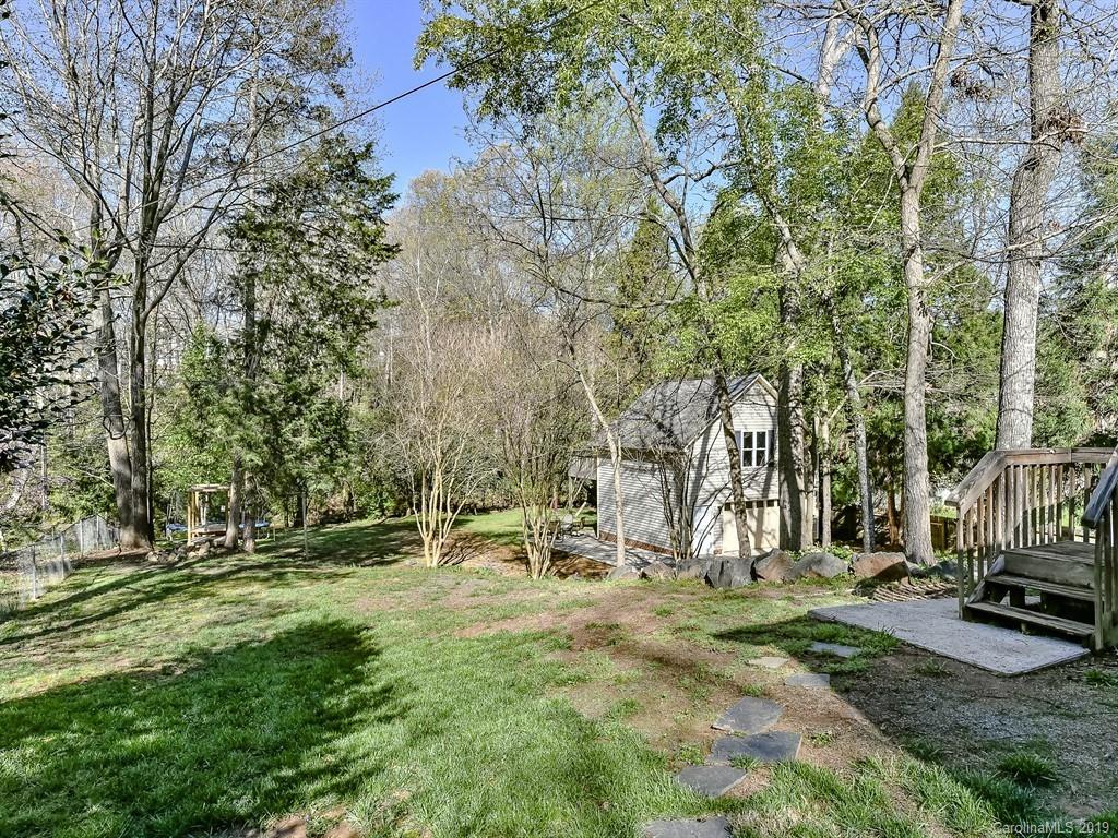 5300 Guildbrook Road Charlotte, NC 28226 - Photo 28 of 35 a view of outdoor space with deck and trees