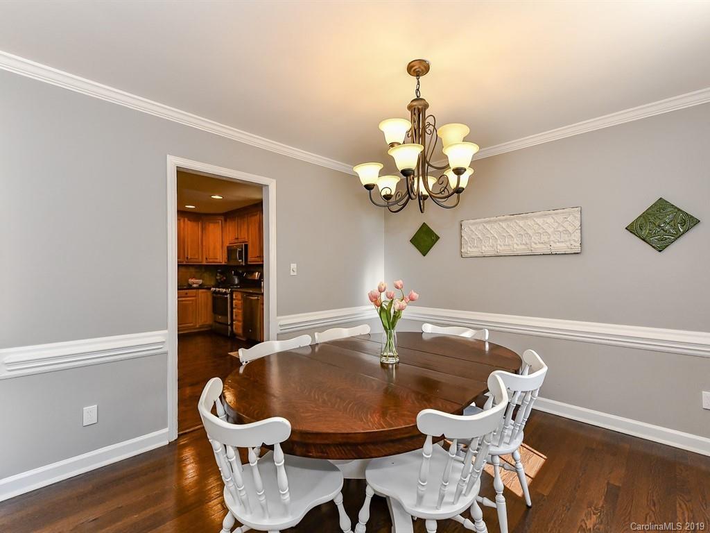 5300 Guildbrook Road Charlotte, NC 28226 - Photo 7 of 35 a dining room with furniture and wooden floor