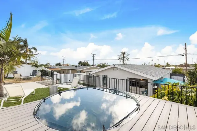a view of a house with roof deck