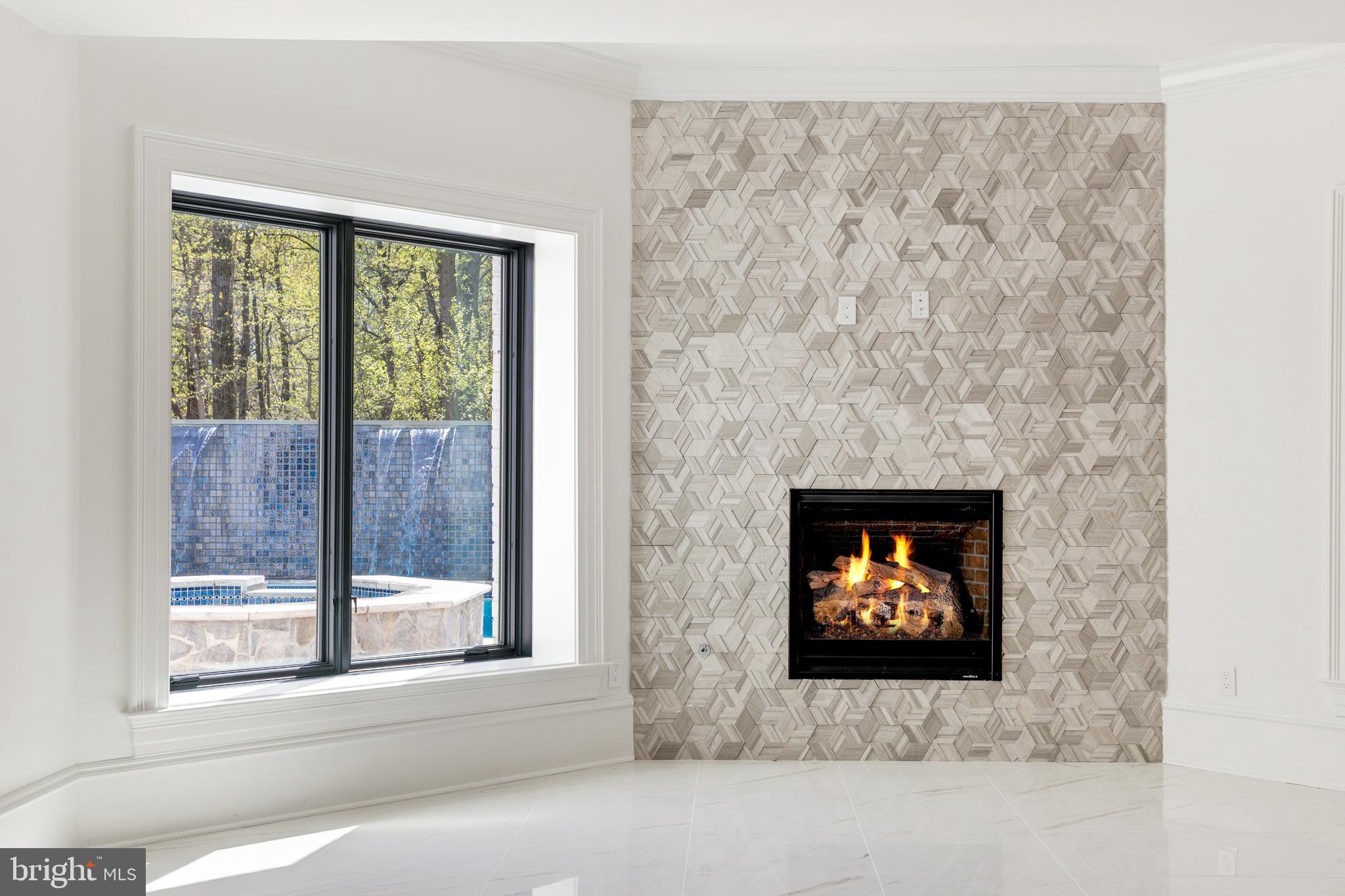 1332 McCay Lane McLean, VA 22101 - Photo 47 of 61 Stacked-stone Fireplace in Rec Room