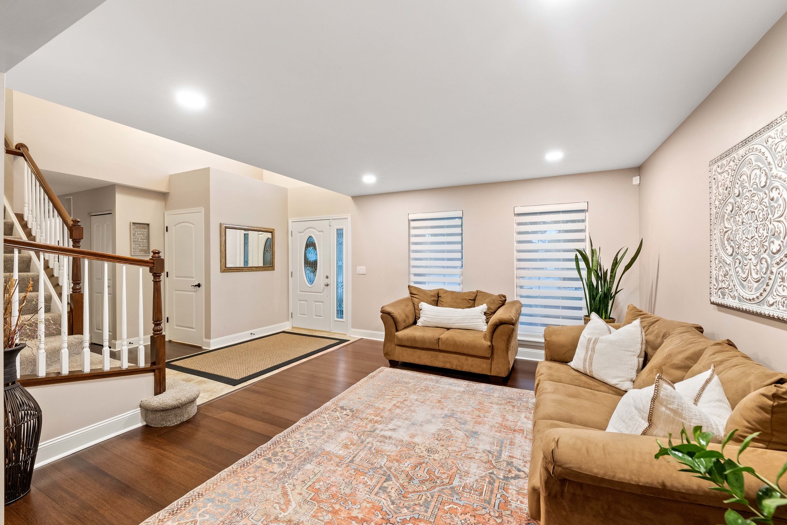 327 Berkeley Drive Bolingbrook, IL 60440 - Photo 11 of 50 a living room with furniture windows and a potted plant