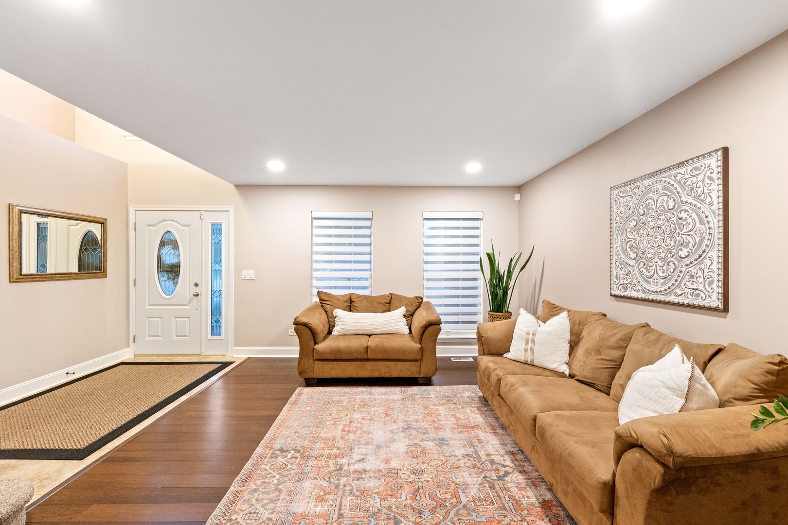 327 Berkeley Drive Bolingbrook, IL 60440 - Photo 12 of 50 a living room with furniture and a couch