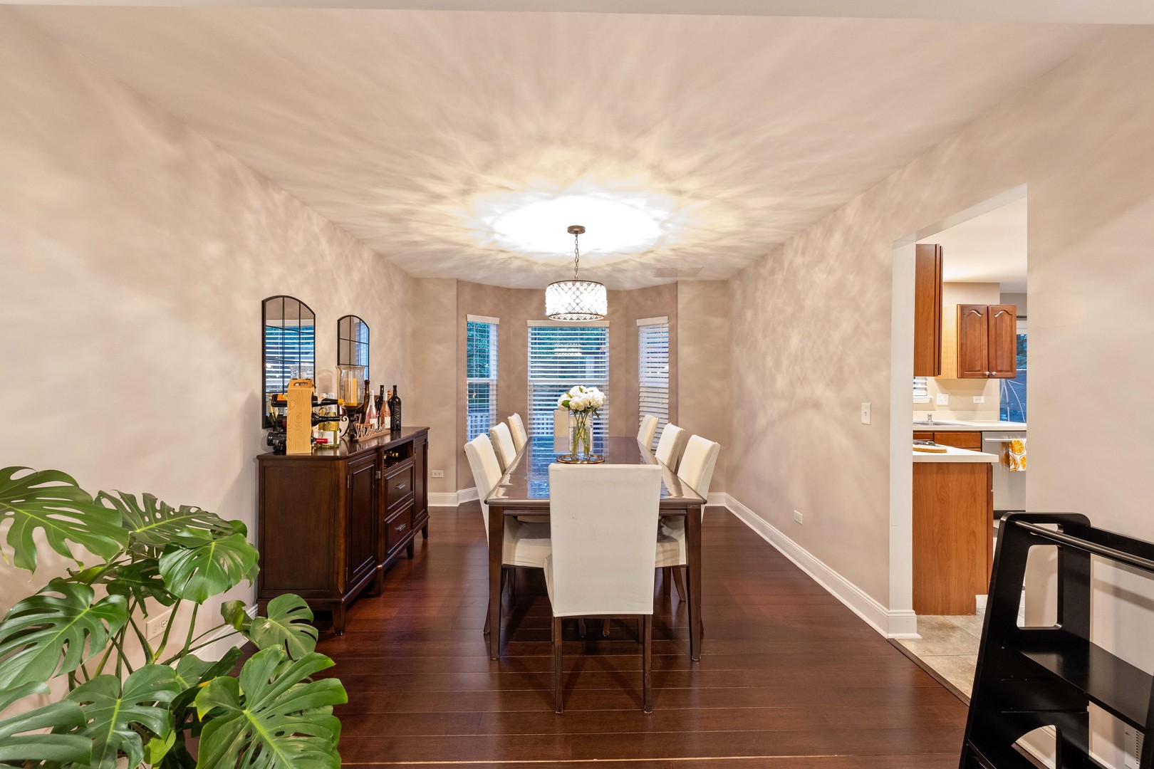 327 Berkeley Drive Bolingbrook, IL 60440 - Photo 13 of 50 a view of a dining room with furniture window and wooden floor