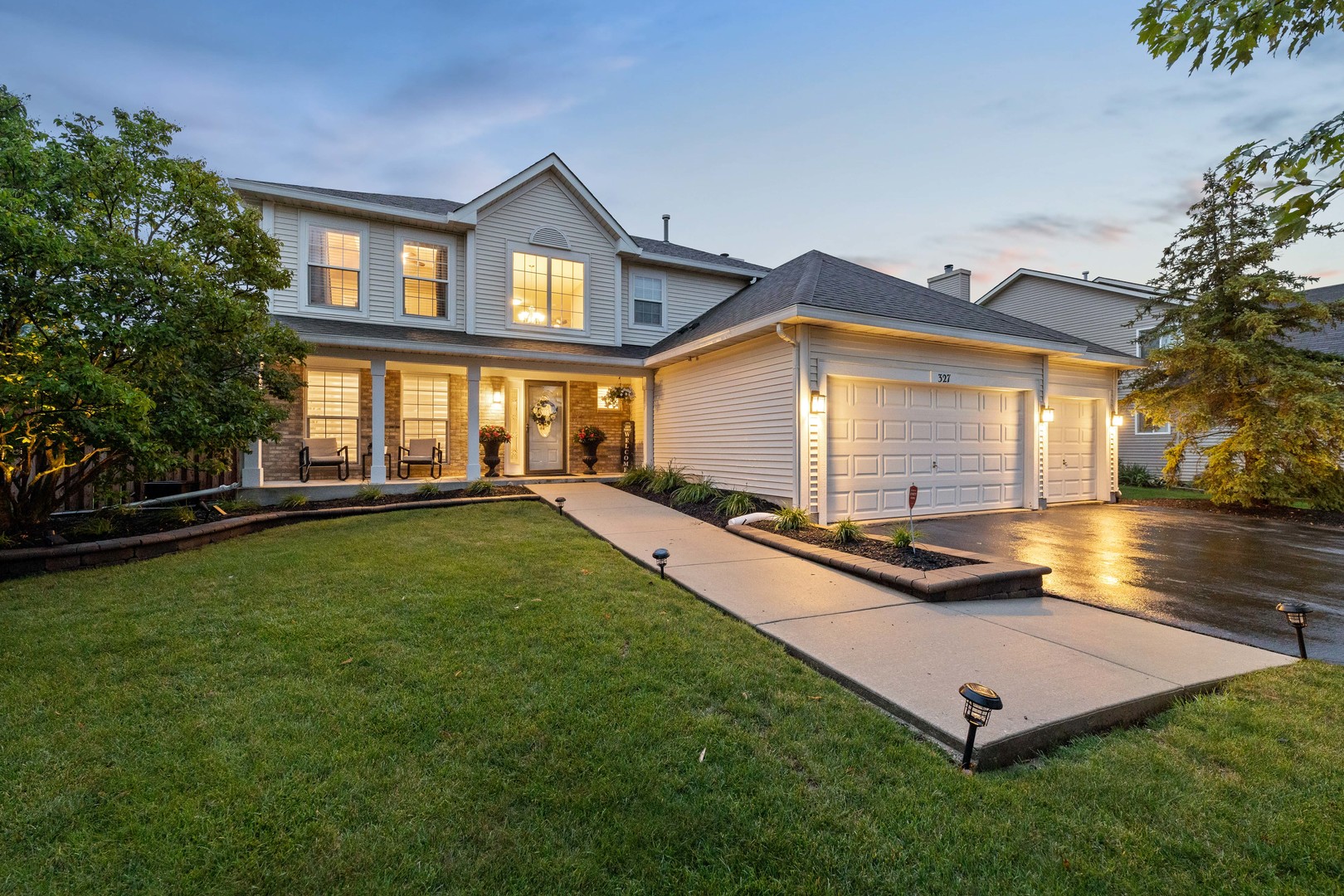 327 Berkeley Drive Bolingbrook, IL 60440 - Photo 2 of 50 a view of a house with a backyard and a tree