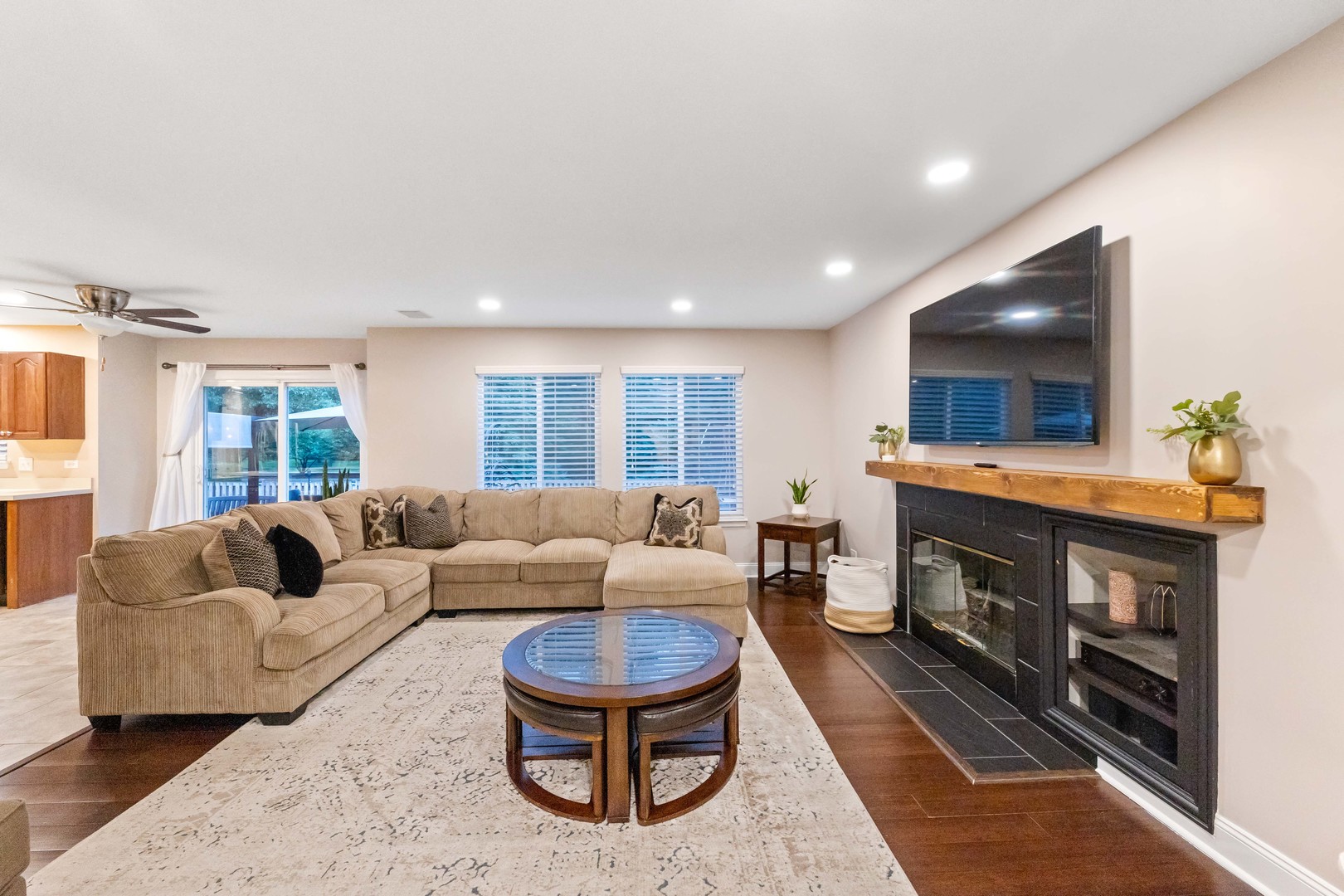 327 Berkeley Drive Bolingbrook, IL 60440 - Photo 21 of 50 a living room with furniture and a flat screen tv