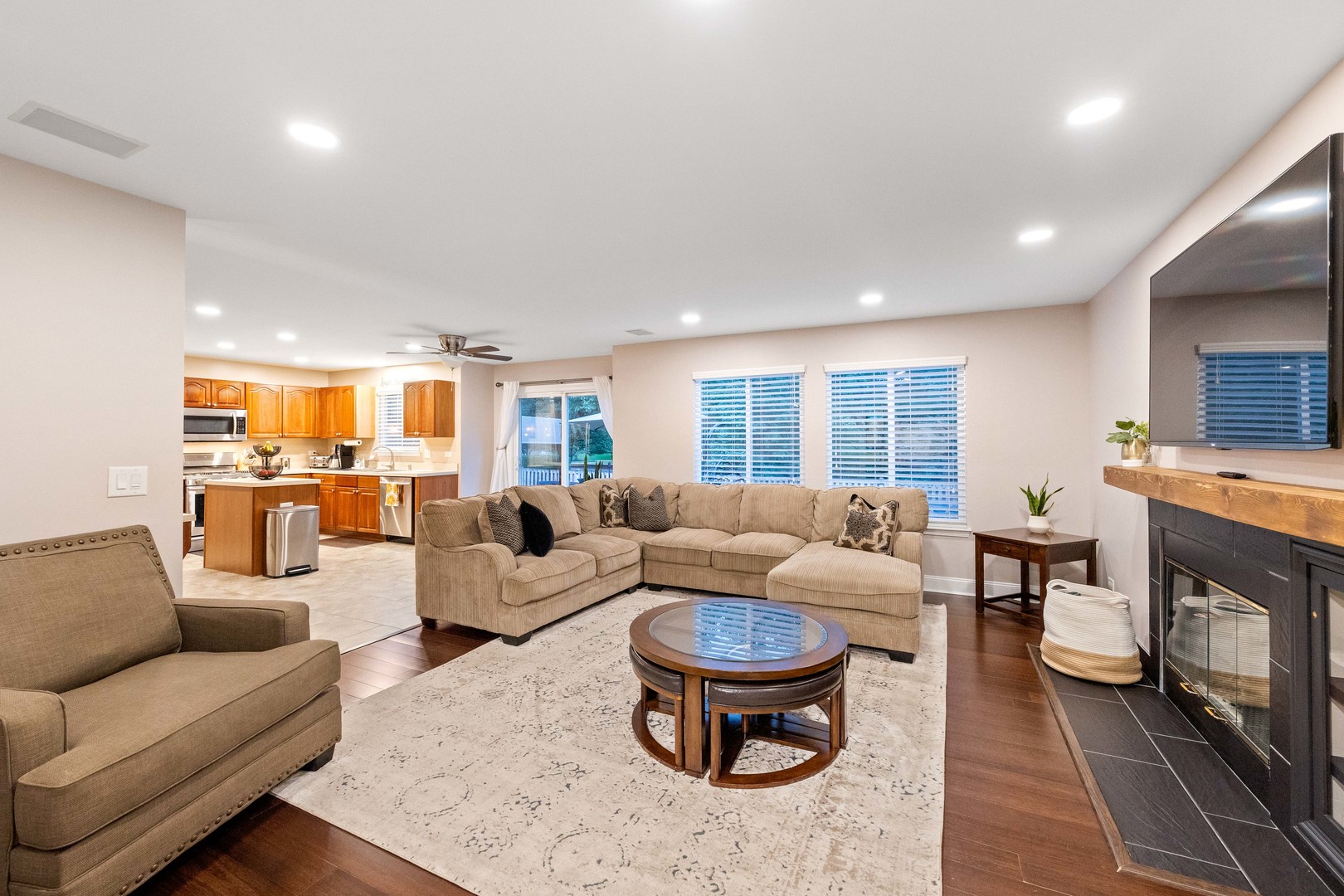 327 Berkeley Drive Bolingbrook, IL 60440 - Photo 22 of 50 a living room with furniture or couch and a fireplace