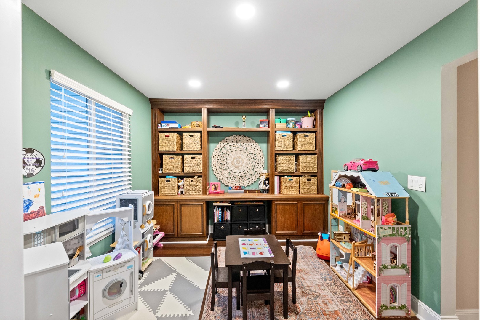327 Berkeley Drive Bolingbrook, IL 60440 - Photo 23 of 50 a view of a workspace with furniture and a window