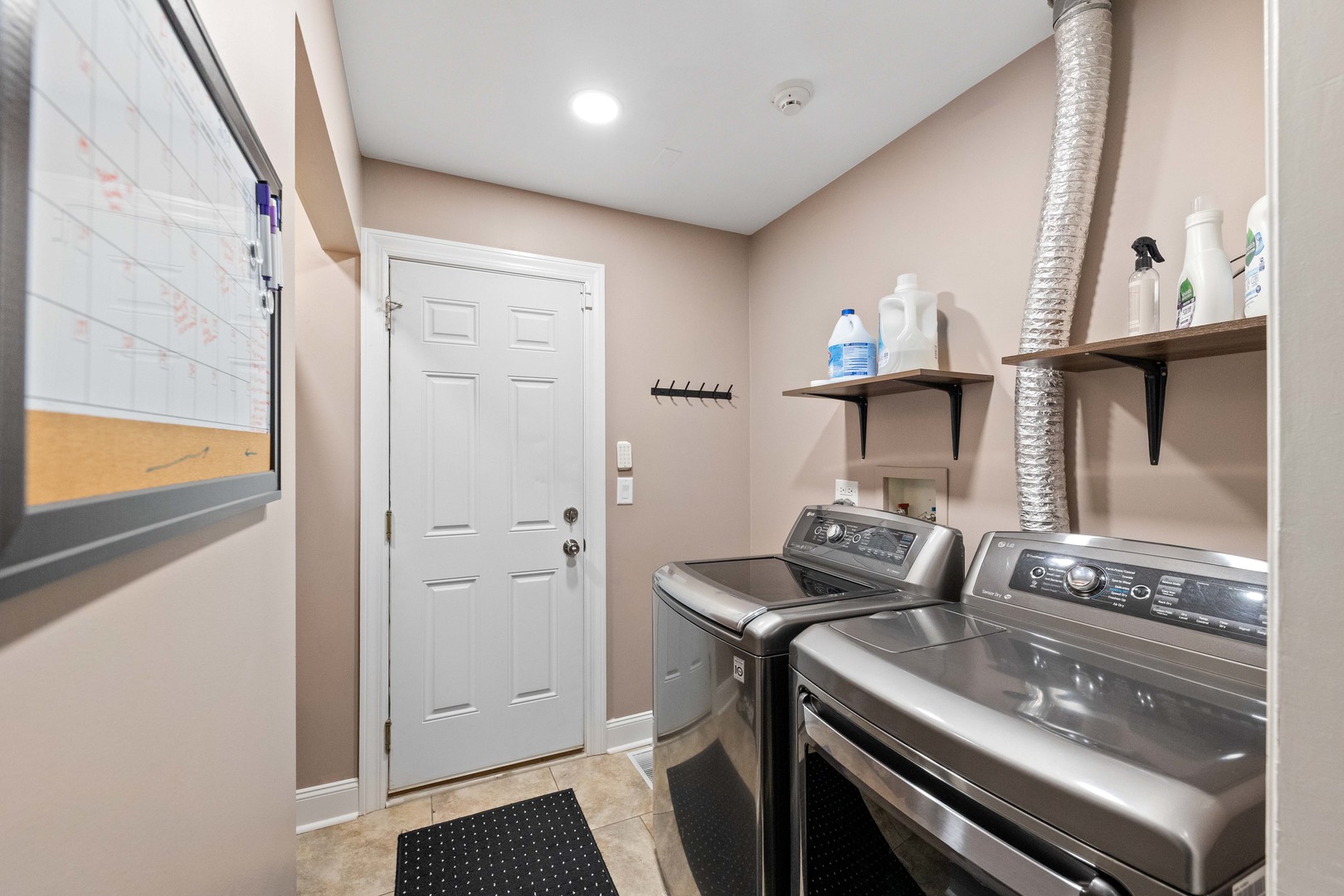 327 Berkeley Drive Bolingbrook, IL 60440 - Photo 24 of 50 a kitchen with a stove and a microwave