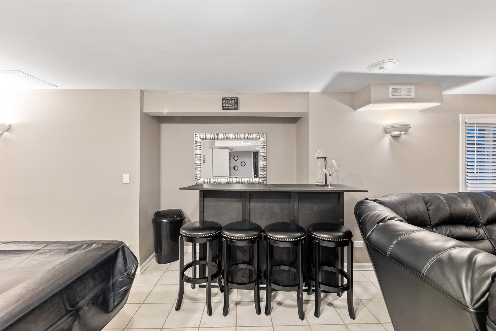 327 Berkeley Drive Bolingbrook, IL 60440 - Photo 28 of 50 a living room with furniture and a window