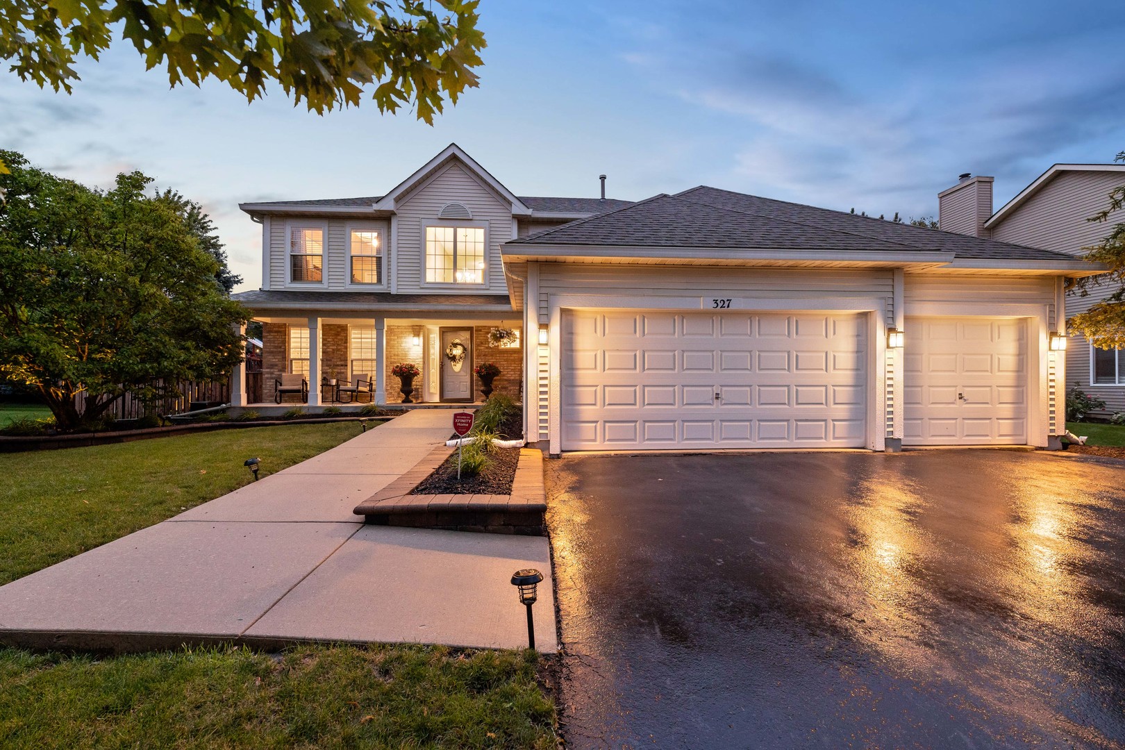 327 Berkeley Drive Bolingbrook, IL 60440 - Photo 3 of 50 a view of a house with a yard