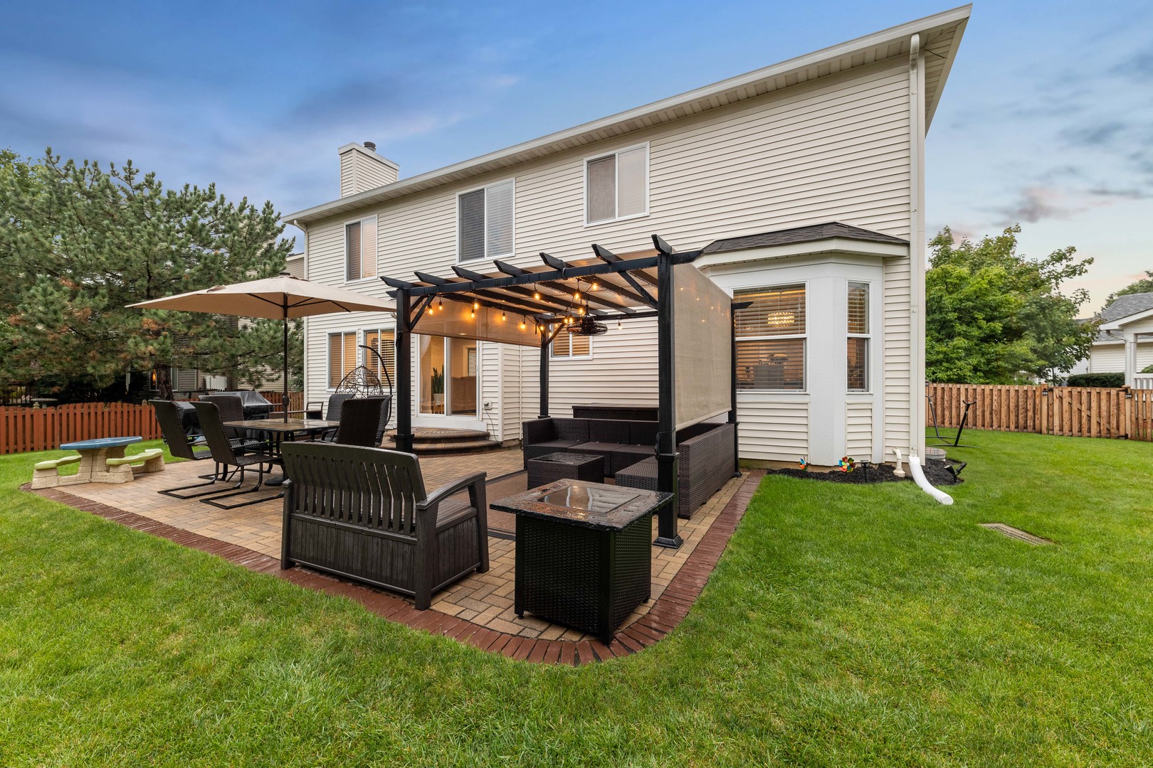 327 Berkeley Drive Bolingbrook, IL 60440 - Photo 9 of 50 a view of a house with backyard and sitting area