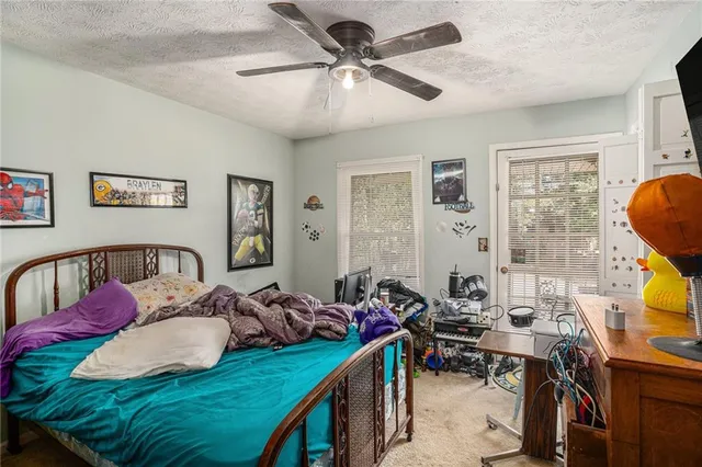a view of a livingroom with furniture and a livingroom