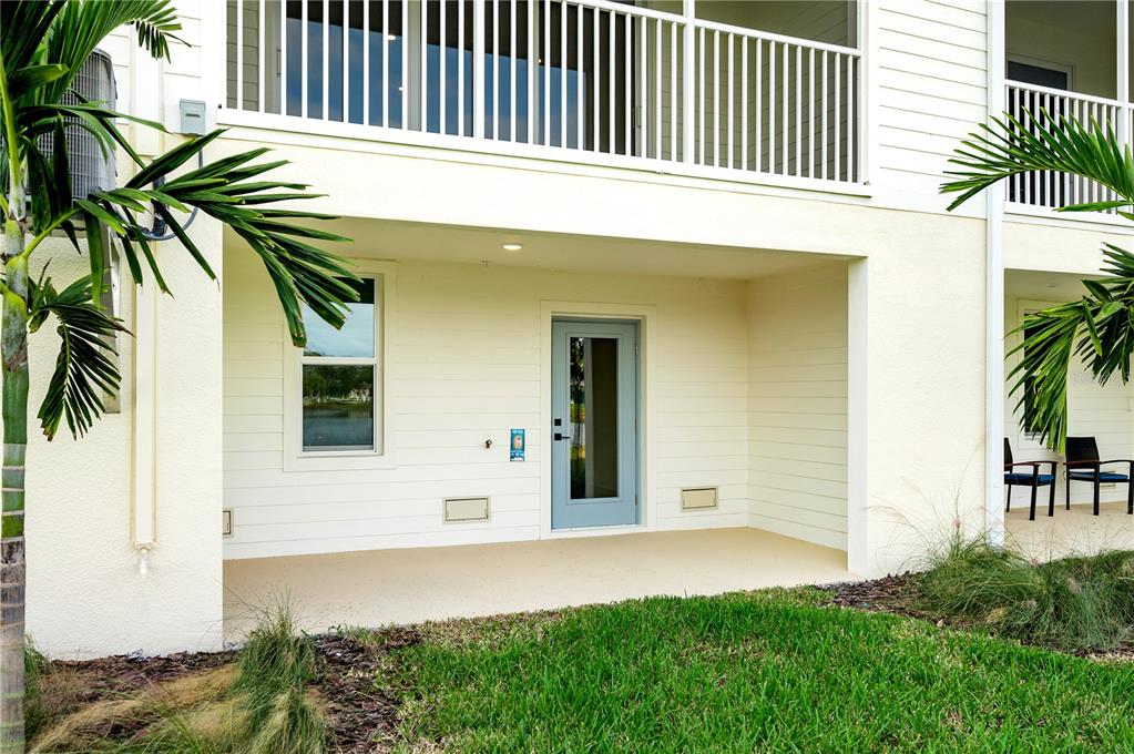 9975 Key Haven Road Seminole, FL 33777 - Photo 6 of 56 a front view of a house with a yard