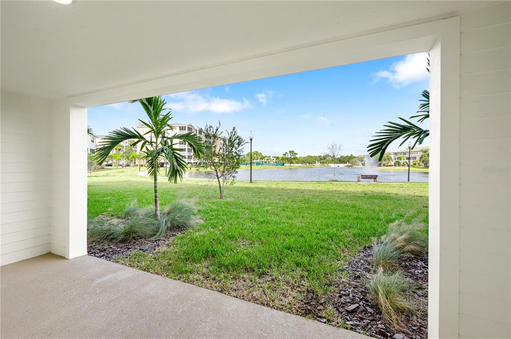 9975 Key Haven Road Seminole, FL 33777 - Photo 7 of 56 a view of a garden with a tree