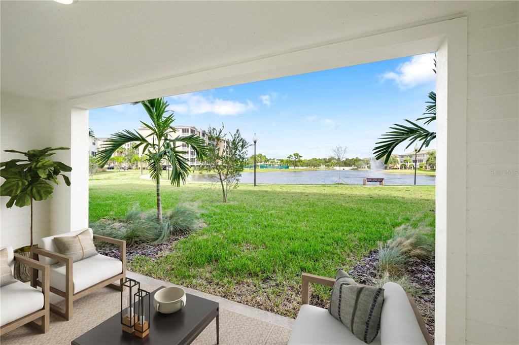 9975 Key Haven Road Seminole, FL 33777 - Photo 8 of 56 a view of a yard with furniture and garden