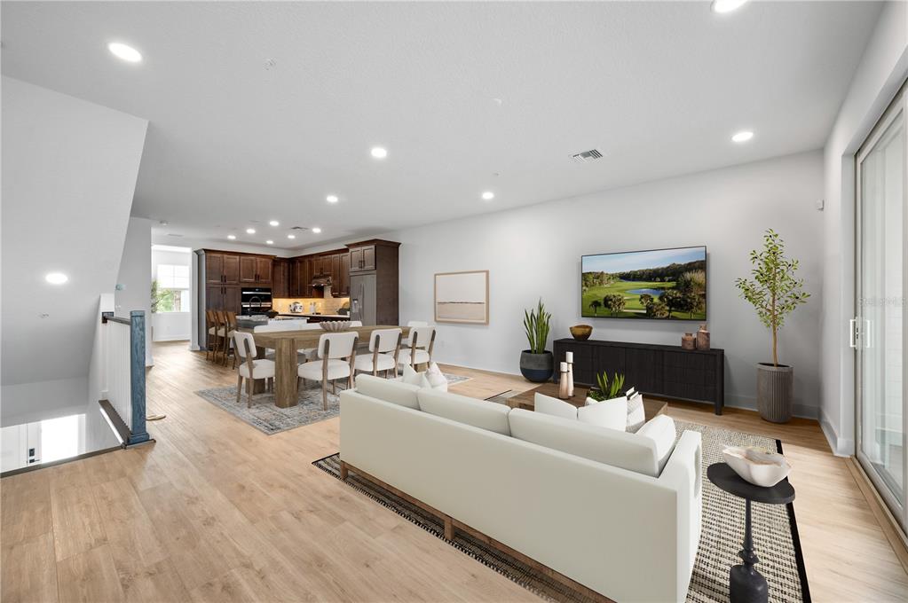 9975 Key Haven Road Seminole, FL 33777 - Photo 10 of 56 a living room with furniture and a wooden floor