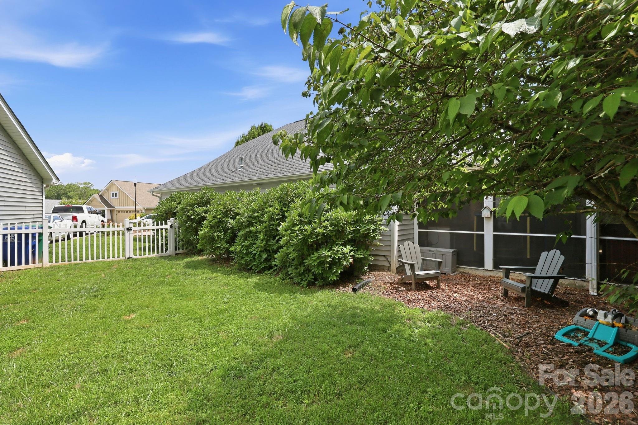 51 Sunview Circle Arden, NC 28704 - Photo 24 of 31 a garden view with a seating space