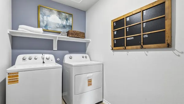 a bedroom with a bed and cupboard