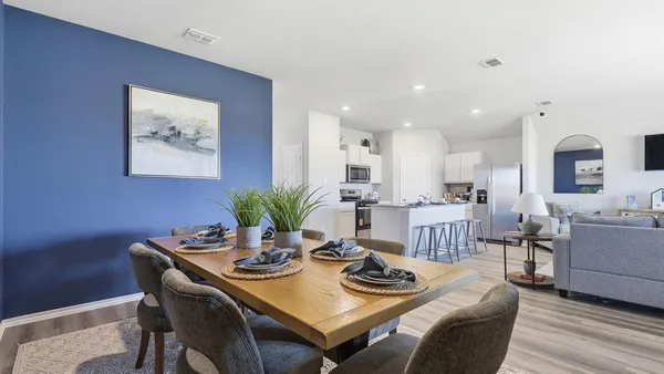 a view of a dining room with furniture