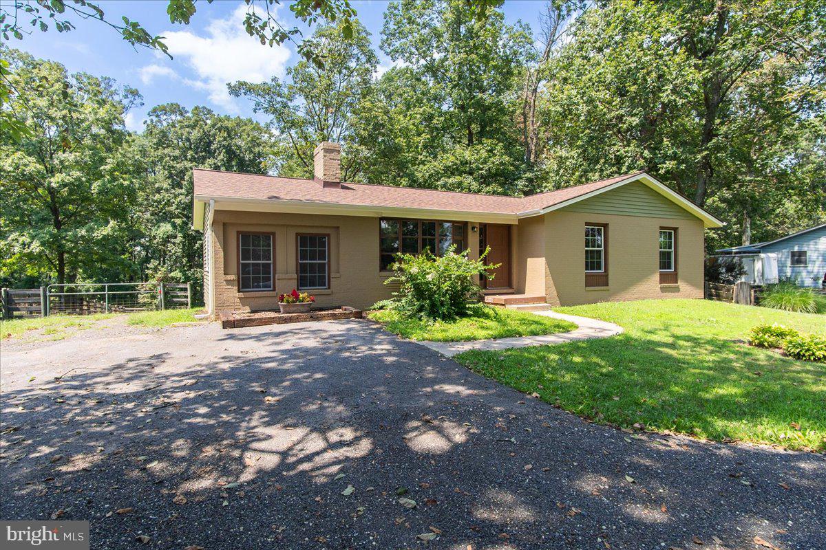 4908 Ridge Road Mount Airy, MD 21771 - Photo 5 of 46 a front view of house with yard and green space