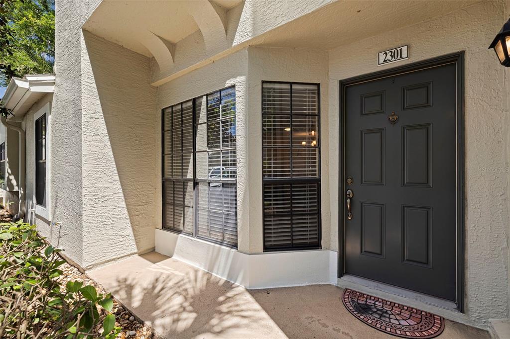 a view of entryway with a front door
