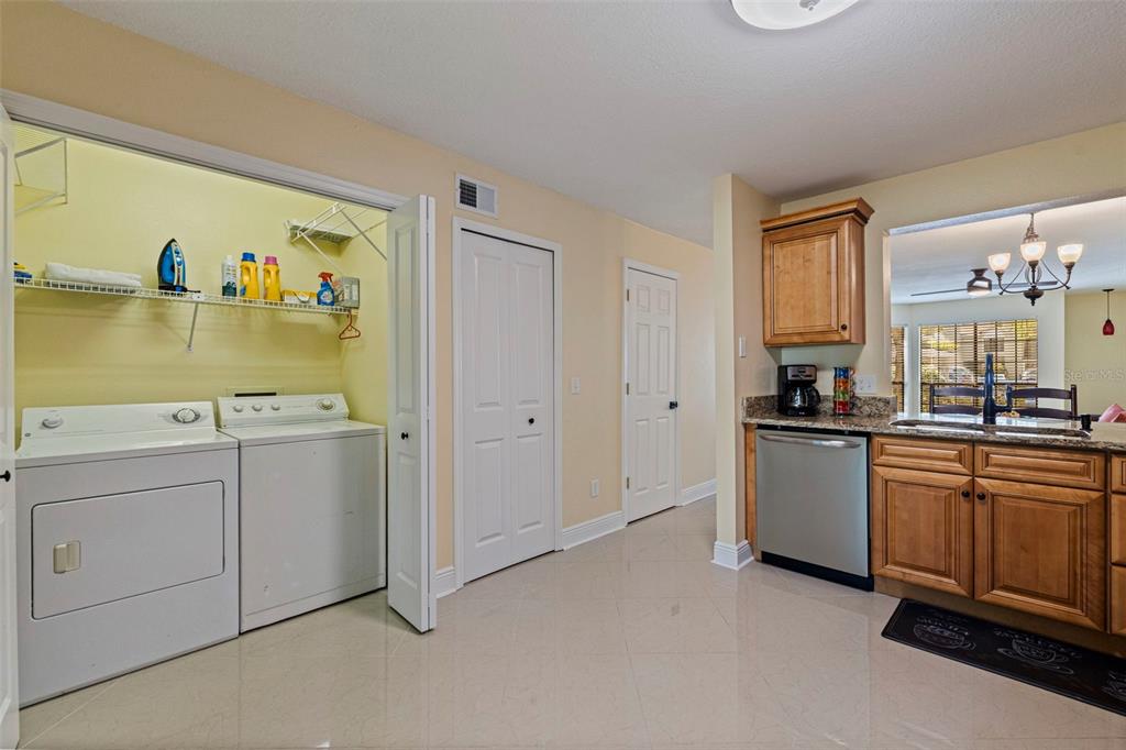 5100 Burchette Road, Unit 2301 Tampa, FL 33647 - Photo 13 of 39 a view of a kitchen with cabinets