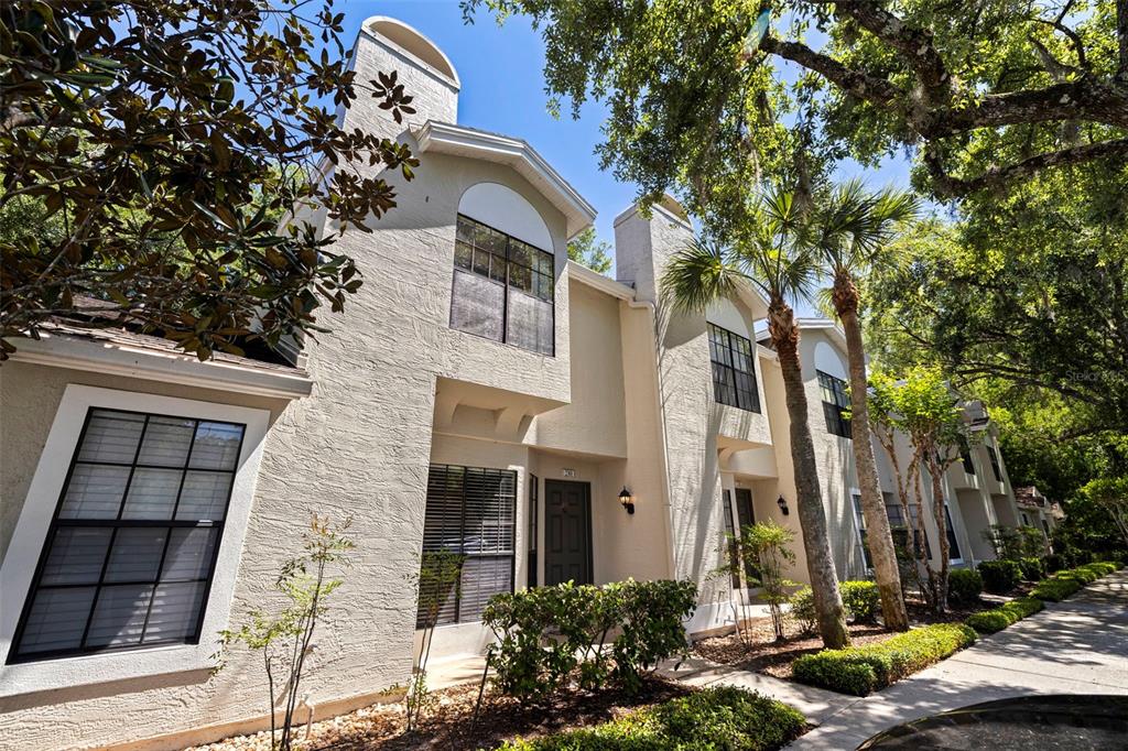 5100 Burchette Road, Unit 2301 Tampa, FL 33647 - Photo 36 of 39 a front view of a house with a tree