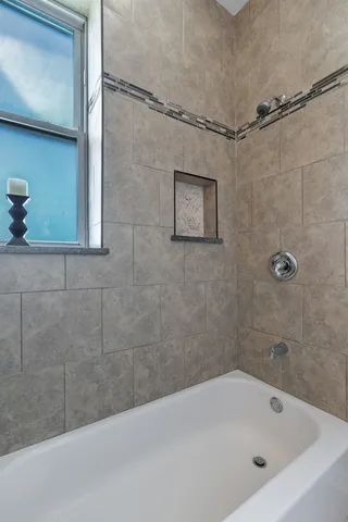 a bathroom with a bathtub