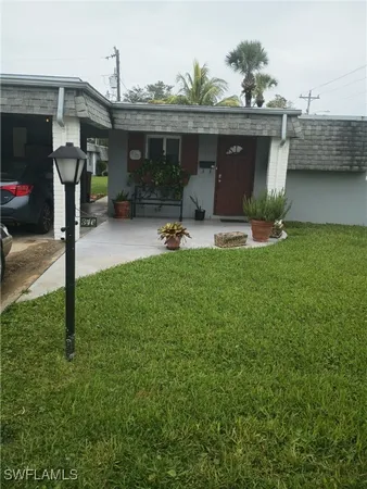 a front view of a house with patio
