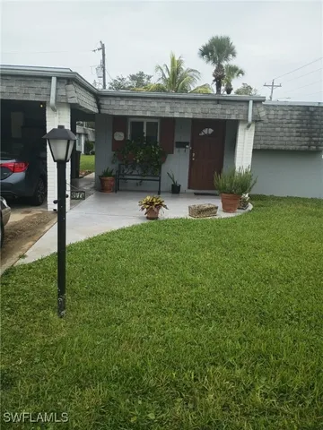 a front view of a house with patio