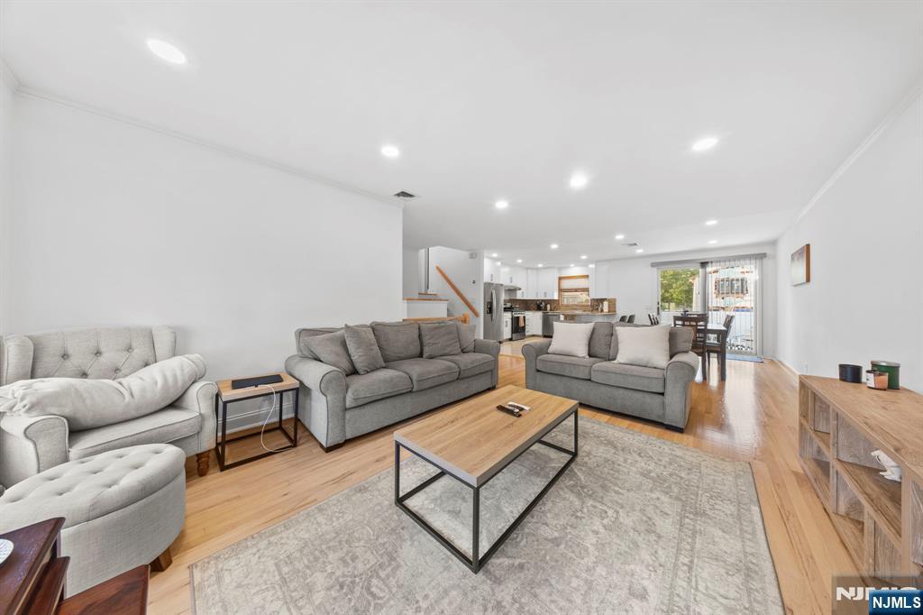 62 Sycamore Road Dumont, NJ 07628 - Photo 4 of 43 a living room with furniture and a couch
