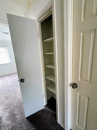 a view of a window in an empty room
