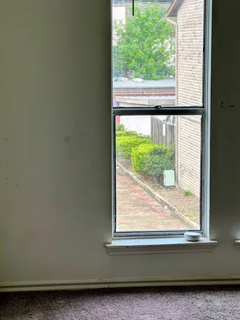 a view of a livingroom with a window