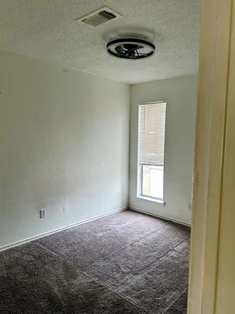 a bathroom with a sink a toilet and tub