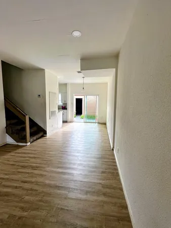 a view of a livingroom with wooden floor