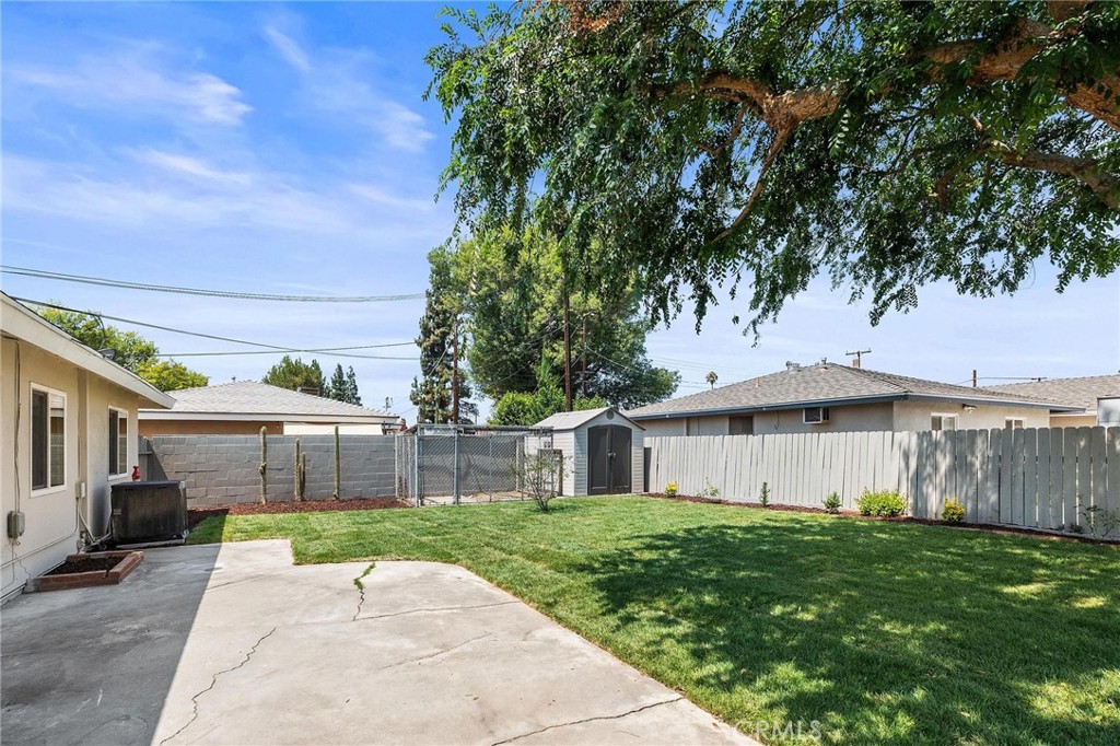 10597 Pendleton Street Riverside, CA 92505 - Photo 17 of 40 a view of a house with a yard