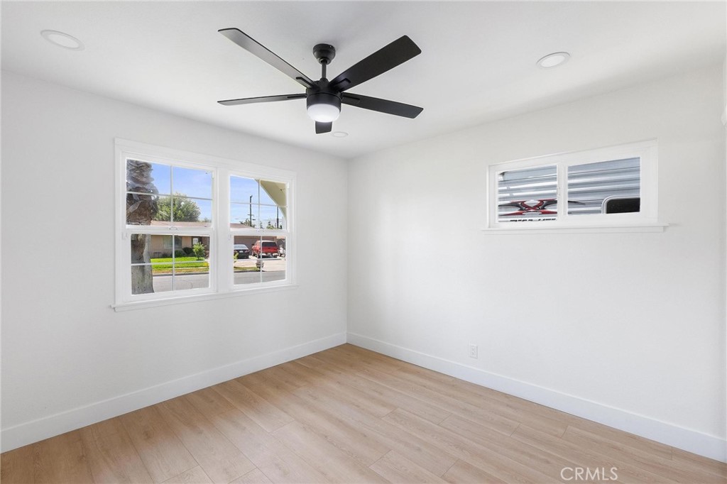 10597 Pendleton Street Riverside, CA 92505 - Photo 26 of 40 wooden floor in an empty room with a window