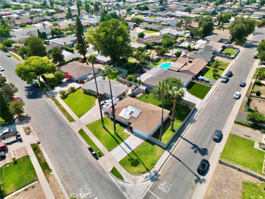 10597 Pendleton Street Riverside, CA 92505 - Photo 37 of 40 an aerial view of a house with a swimming pool yard and outdoor seating