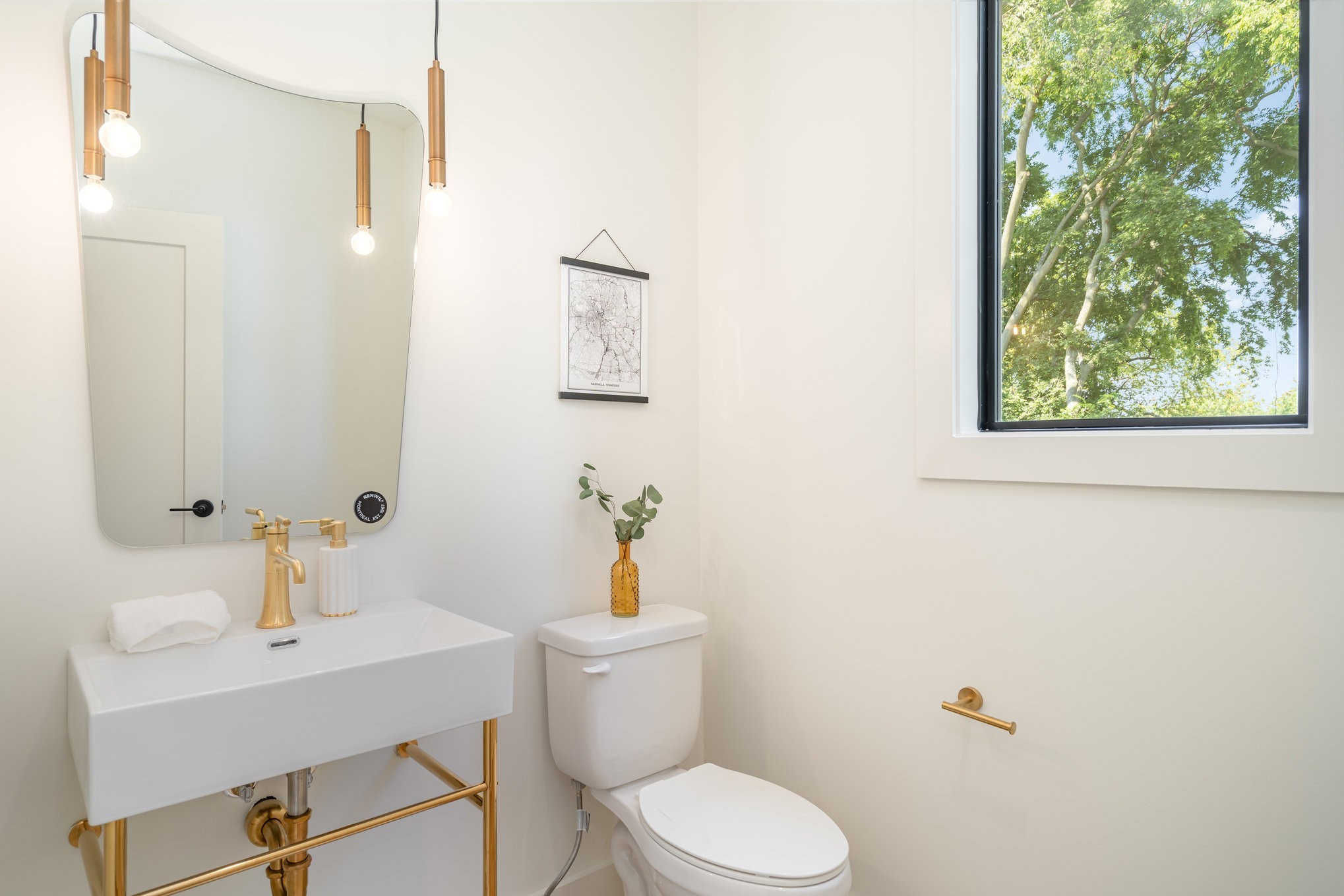 542 D Rosedale Avenue, Unit 7 Nashville, TN 37211 - Photo 9 of 33 a bathroom with a sink mirror vanity and toilet