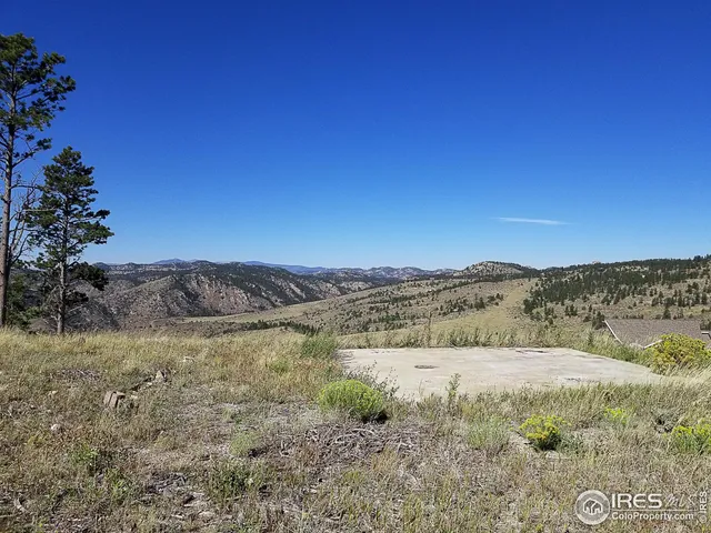 a view of mountain with lake view