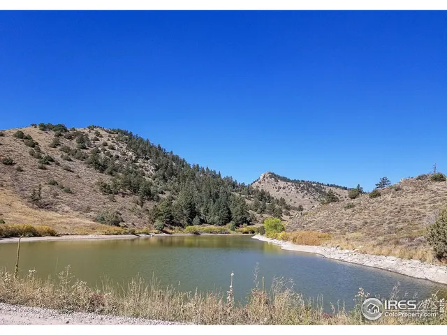 a view of lake and mountain