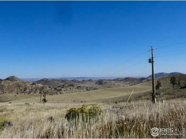 a view of a lake with a mountain in the background