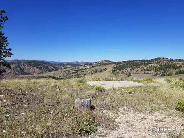 a view of lake with mountain