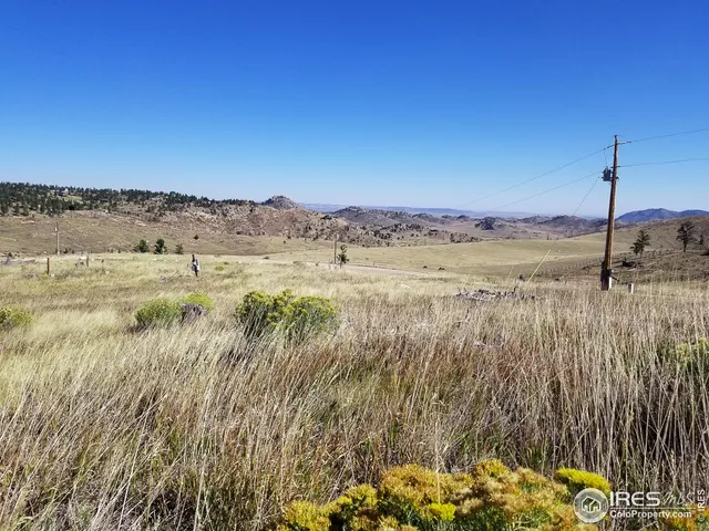 a view of a lake with a mountain in the background