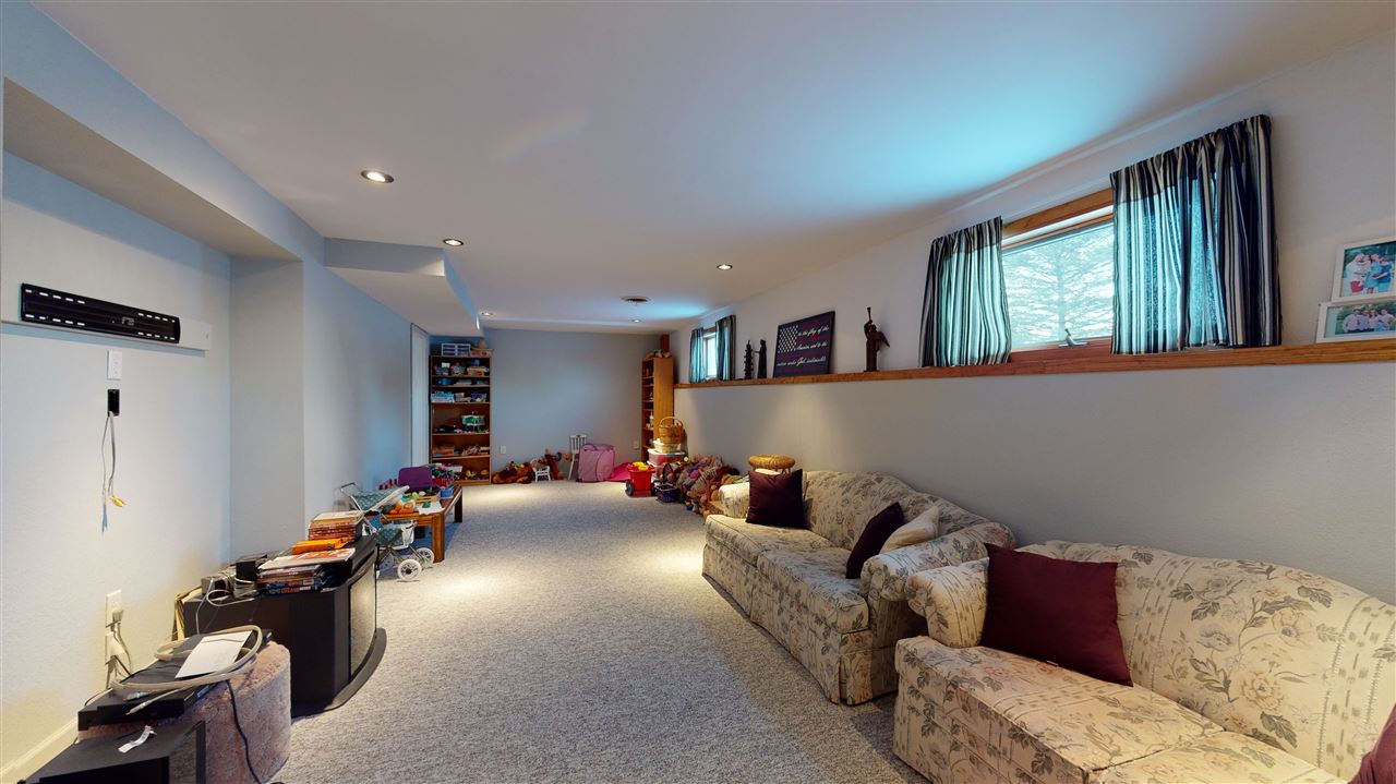 3028 South Golf Road Stockton, IL 61085 - Photo 22 of 26 a living room with furniture and a window
