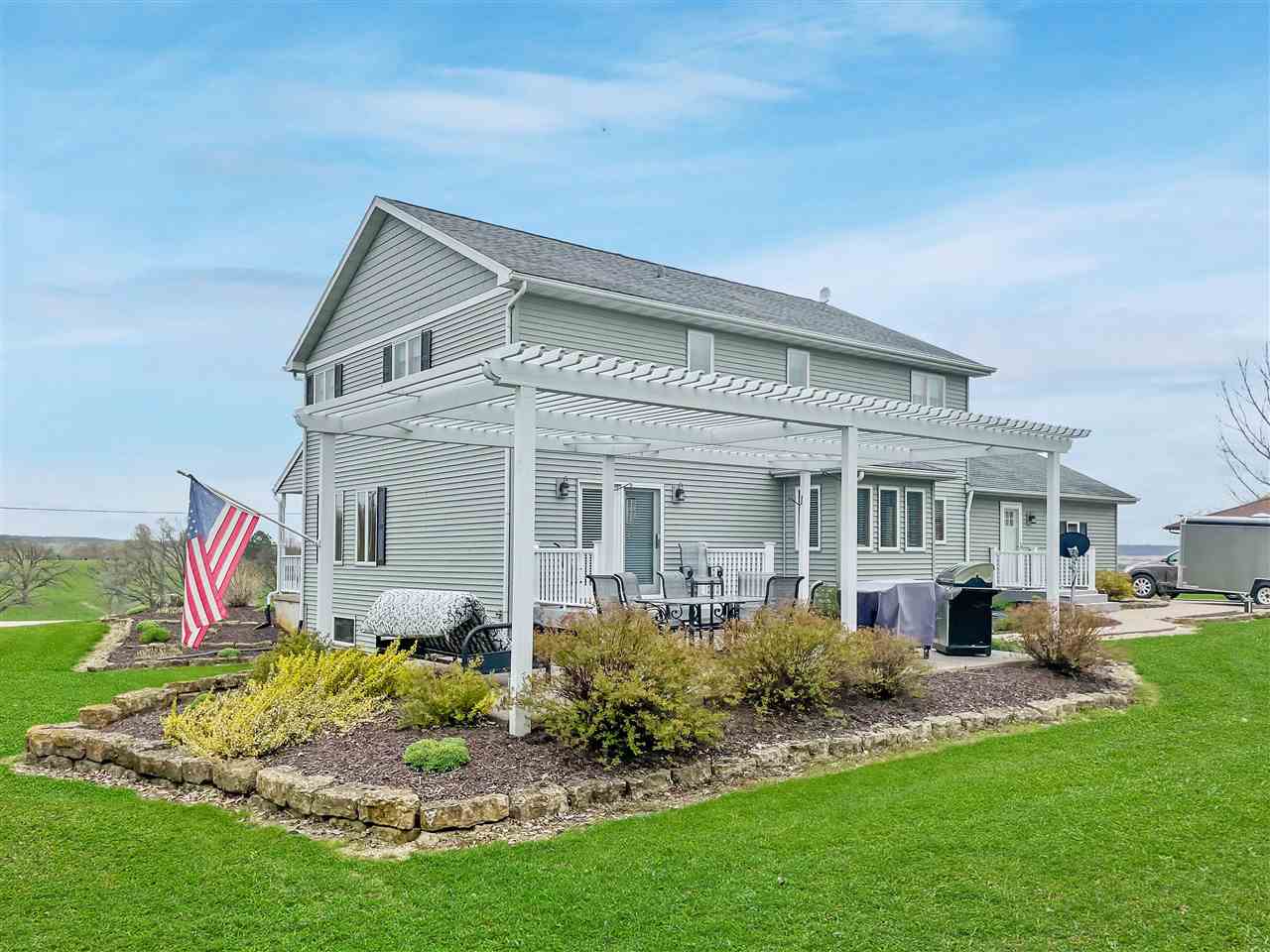 3028 South Golf Road Stockton, IL 61085 - Photo 25 of 26 a front view of house with a garden