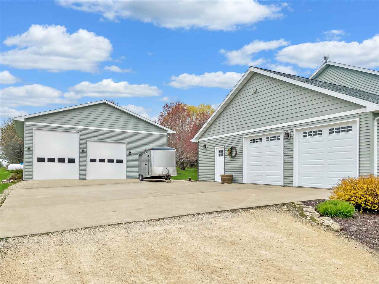 3028 South Golf Road Stockton, IL 61085 - Photo 3 of 26 a house with a outdoor space