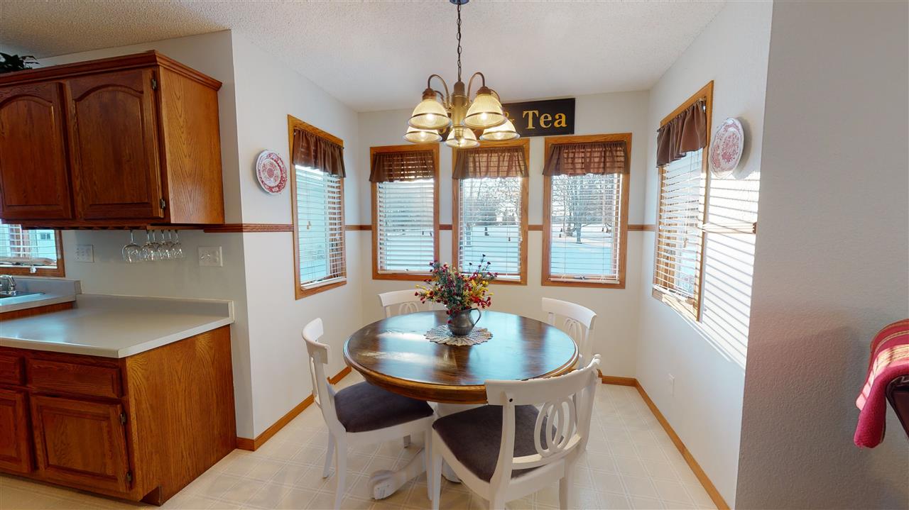 3028 South Golf Road Stockton, IL 61085 - Photo 10 of 26 a dining room with furniture and window