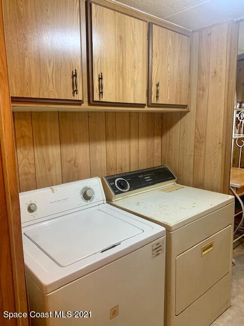 3315 Brockett Road Mims, FL 32754 - Photo 12 of 27 a utility room with dryer and washer